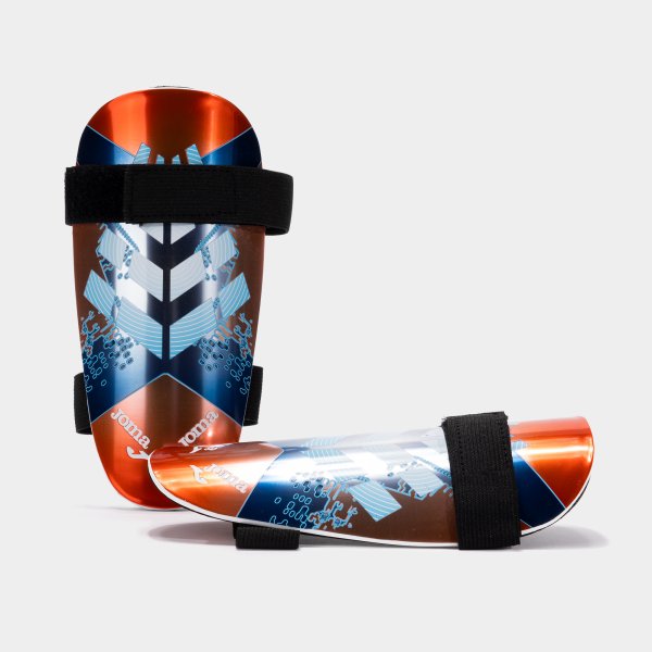 PROTEGE-TIBIAS DEFENSE CORAIL FLUO BLEU