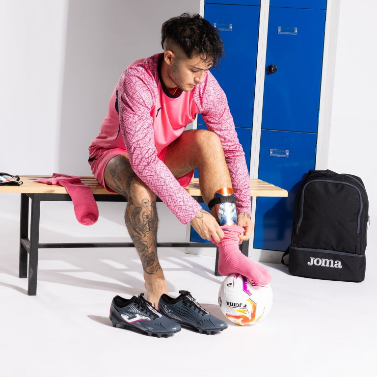 PROTEGE-TIBIAS DEFENSE CORAIL FLUO BLEU